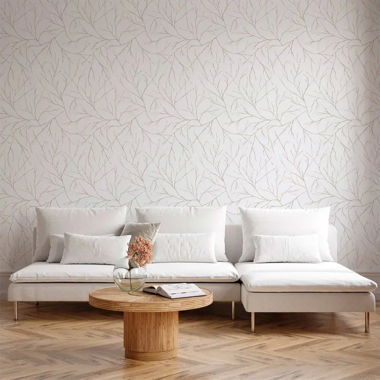 Minimalismo - rami beige chiaro intrecciati tra loro su sfondo bianco